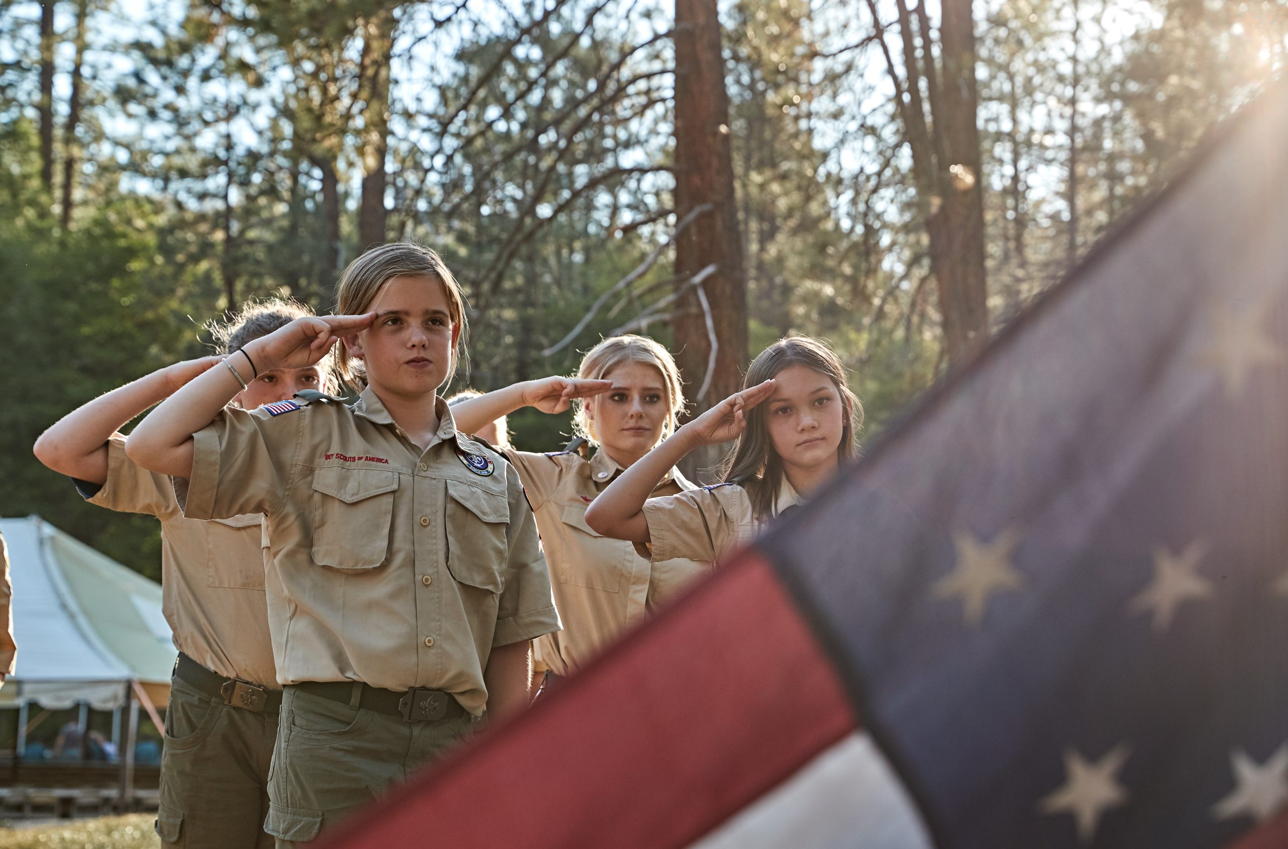 girls saluting flag